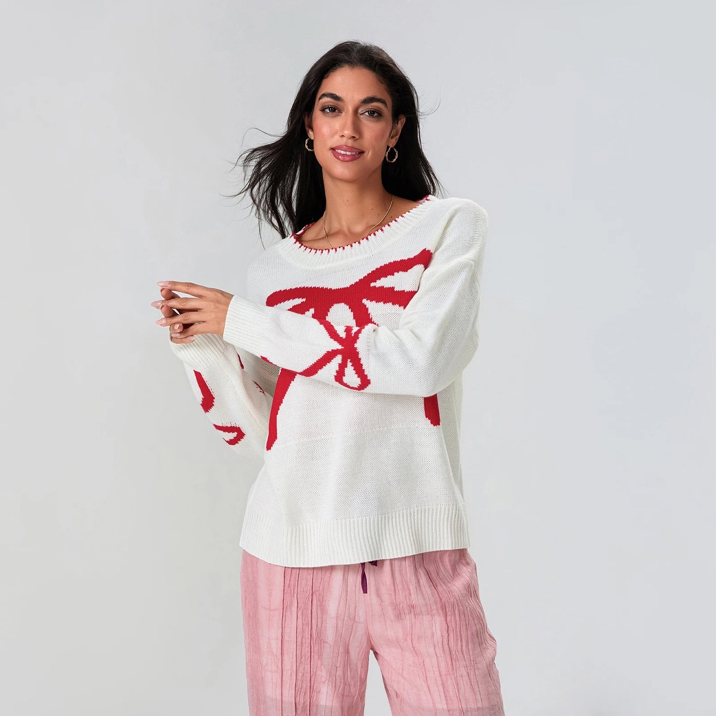 Frieda | Festlicher Strickpullover mit Schleifen-Design