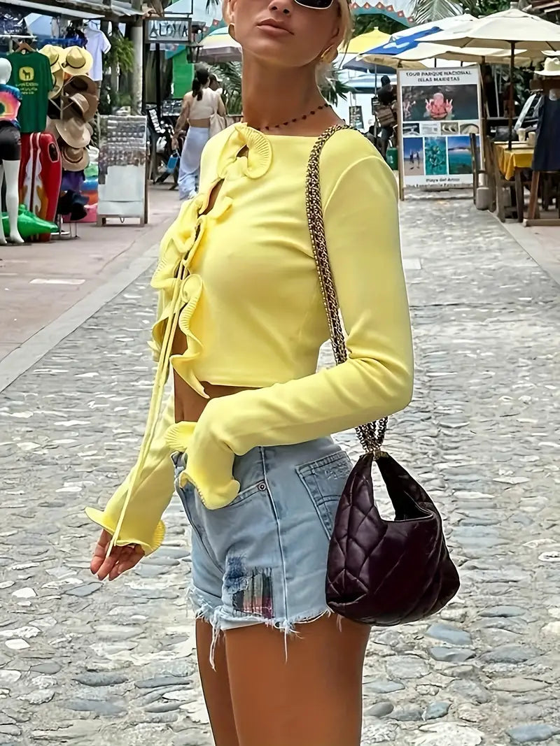 Gemütliche Strickjacke mit Rüschen und Knoten-Detail vorne