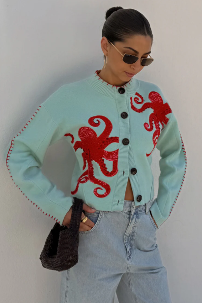 Gemütliche Küstenstrickjacke mit Oktopus-Motiv und Kontrastpaspelierung