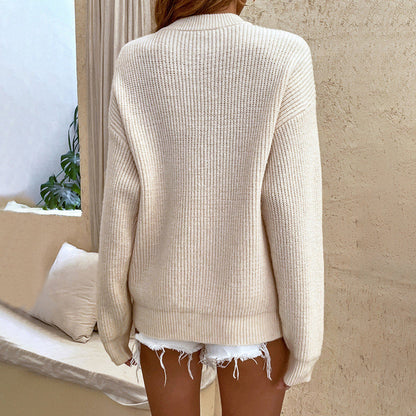 Gemütlicher Strickpullover mit stilvollem Knopfkragen