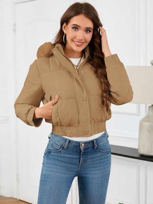 Gemütliche wattierte Winterjacke mit Pelzkapuze und Taschen
