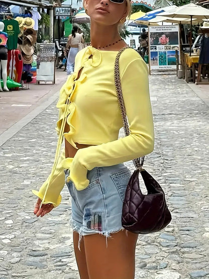 Gemütliche Strickjacke mit Rüschen und Knoten-Detail vorne