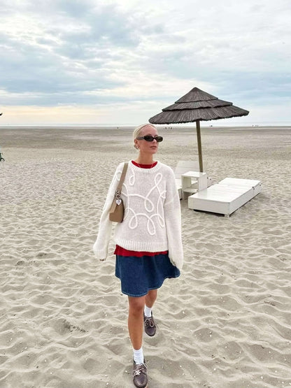 Gemütlicher Oversize-Pullover mit eleganten Stickereien