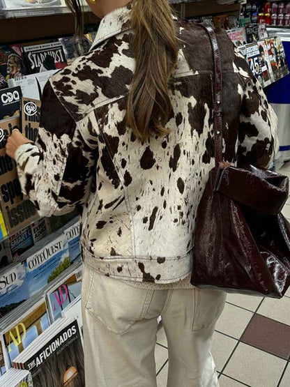 Jacke mit Kuhmuster, Reverskragen und stilvollen Druckknöpfen