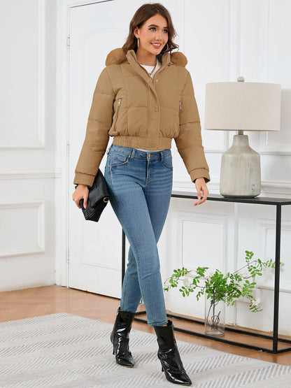 Gemütliche wattierte Winterjacke mit Pelzkapuze und Taschen